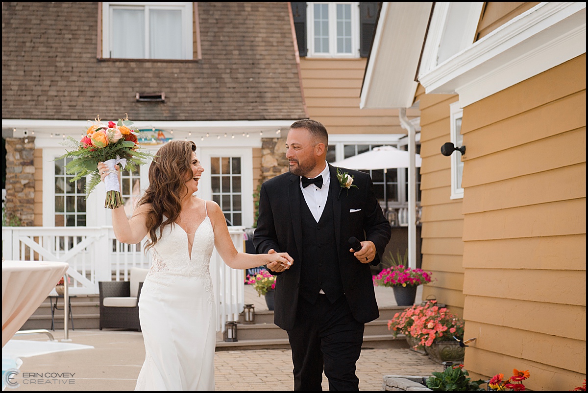 Bride and Groom Entering Wedding Reception