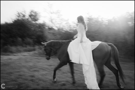 Black and White Photos of Bride Riding Horse