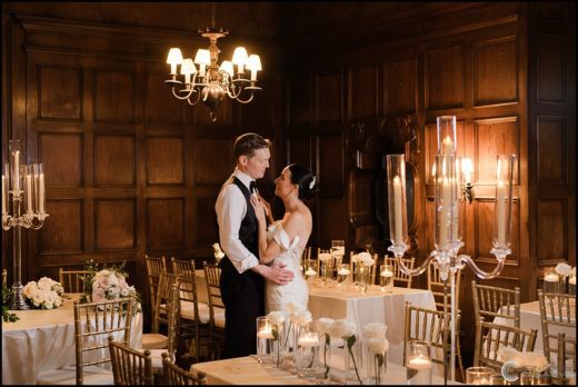 Bride and Groom in Decorated Ballroom at Fort Schuyler Club